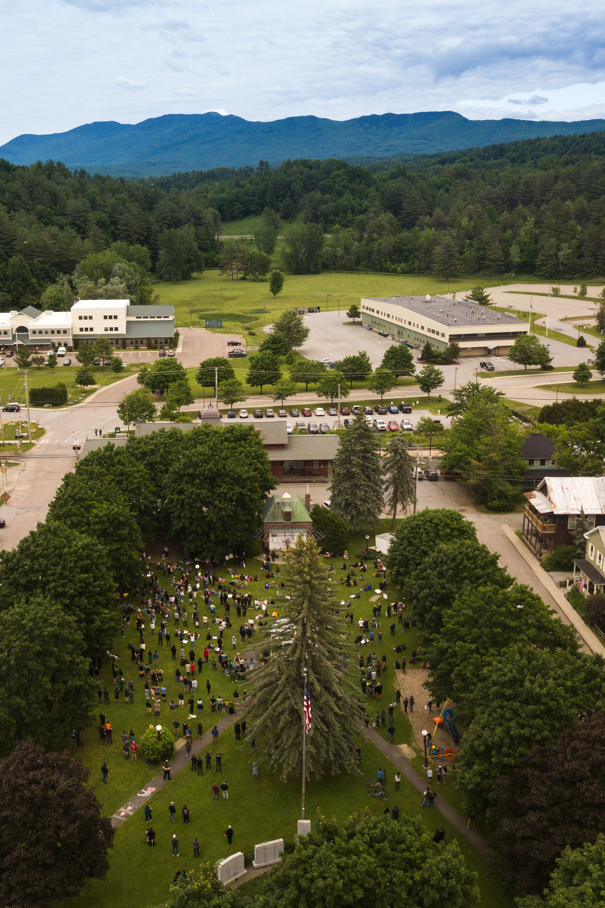 Aerial view of people congregating in Rusty Parker Memorial Park in Waterbury